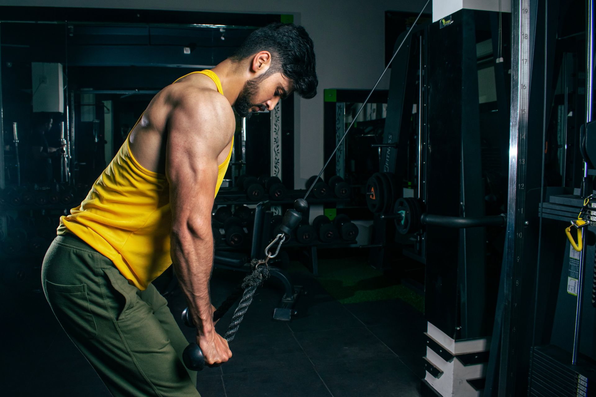 Lifter using a cable machine in a home gym